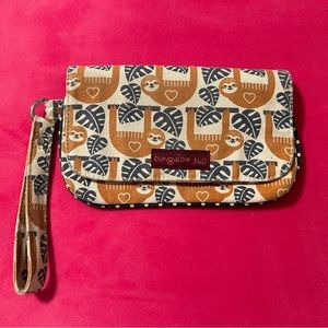 BUNGALOW 360 canvas snap wristlet with orange sloths. Super cute!